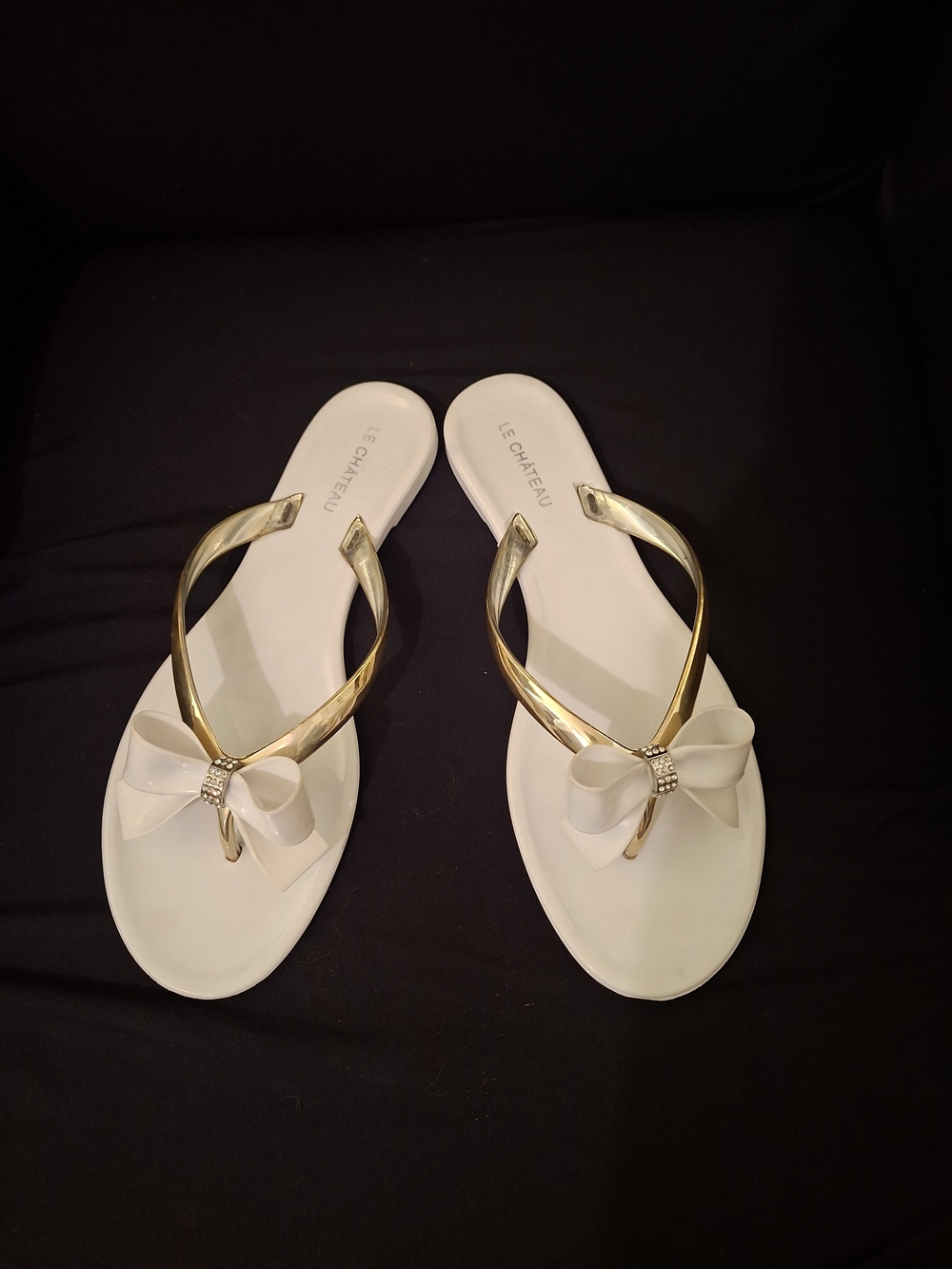 le chateau White Bow Sandals with Gold Straps